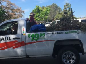 image of U-Haul truck full of trash.