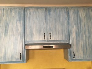 Photo of cabinets above stove