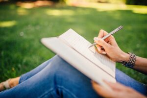 Photo of woman writing